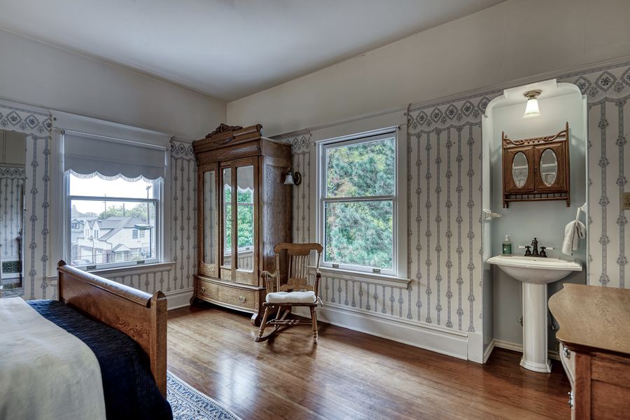 The Anglin Suite's pedestal sink and wardrobe